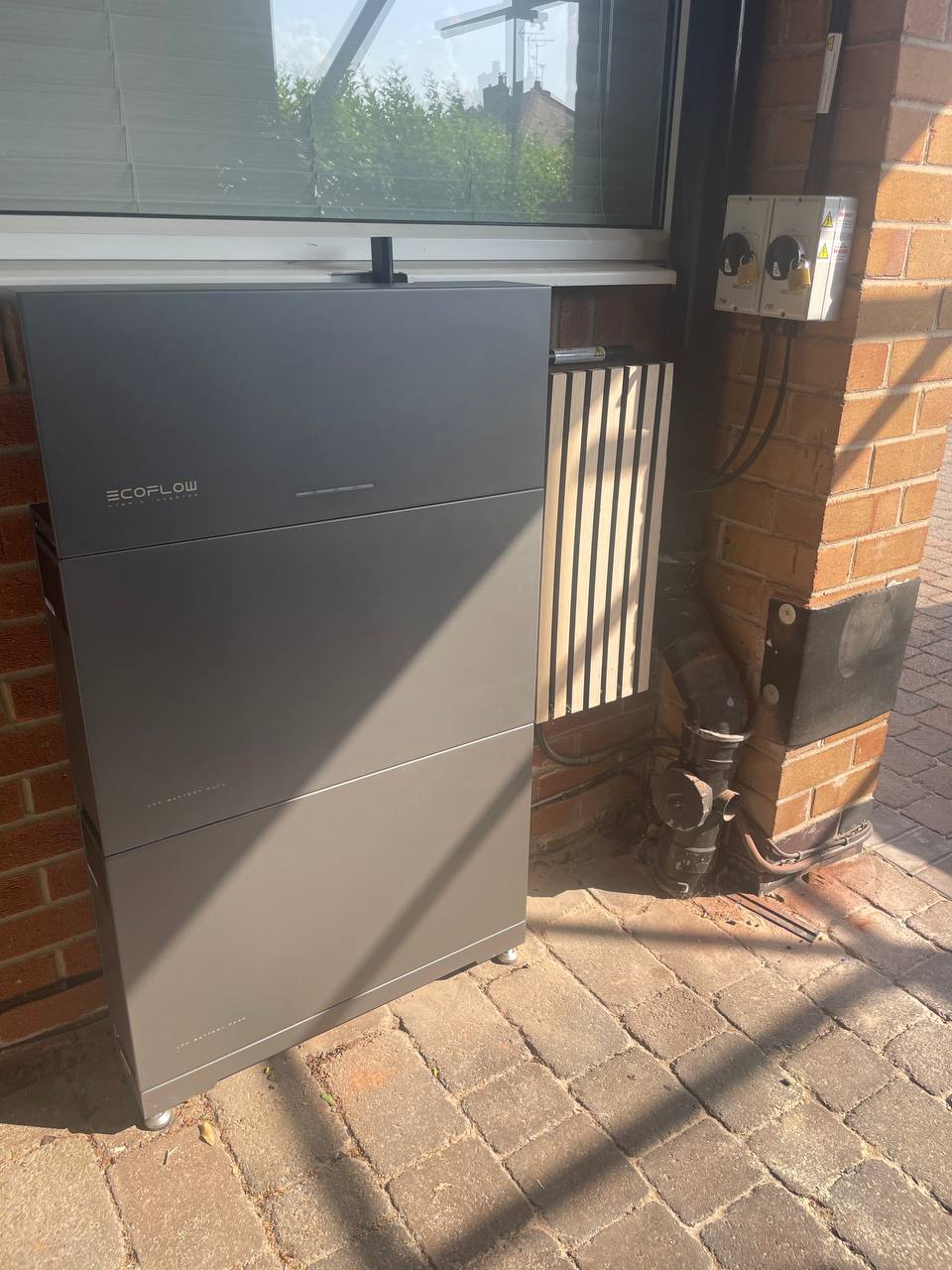 EcoFlow PowerOcean home battery installed outside a local property near Derby